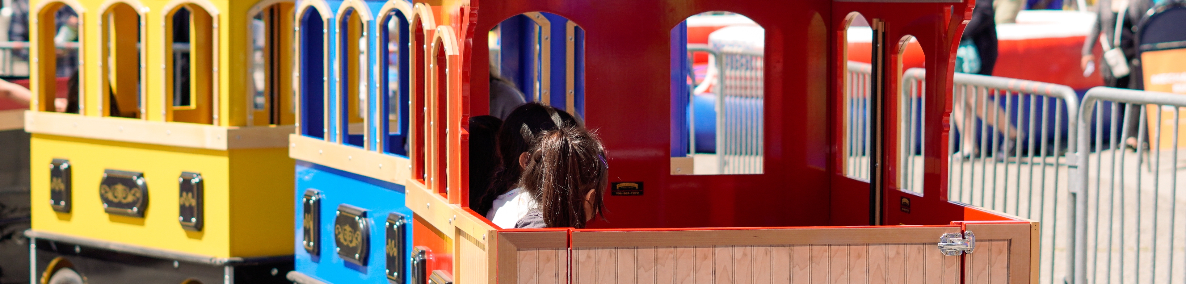 Kids riding the trackless train at Vintage Days 2023